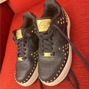 Nike Black and Gold Star-Studded Sneakers